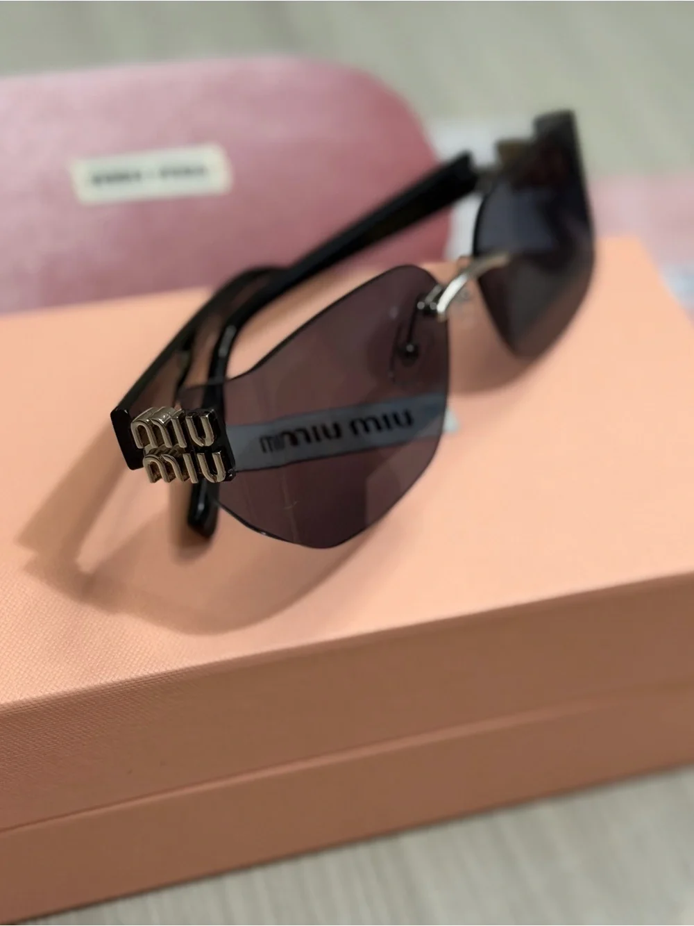 Miu Miu Slim Rectangular Sunglasses in Plum Tint
